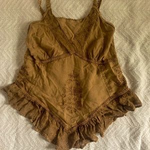 rebellion top with detailing